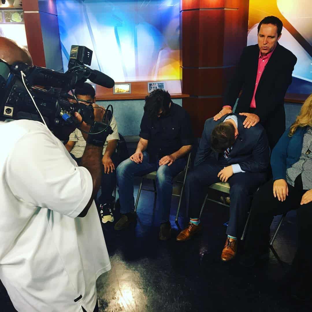 Comedy hypnotist Richard Barker performing live hypnosis demonstration on television