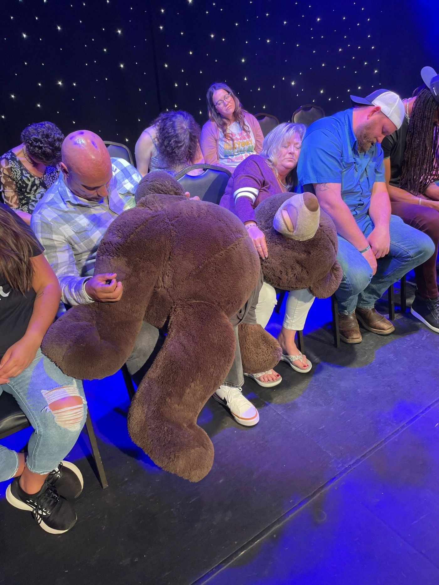 Hypnotized volunteers asleep on stage during The Comedy Hypnosis Hour in Myrtle Beach